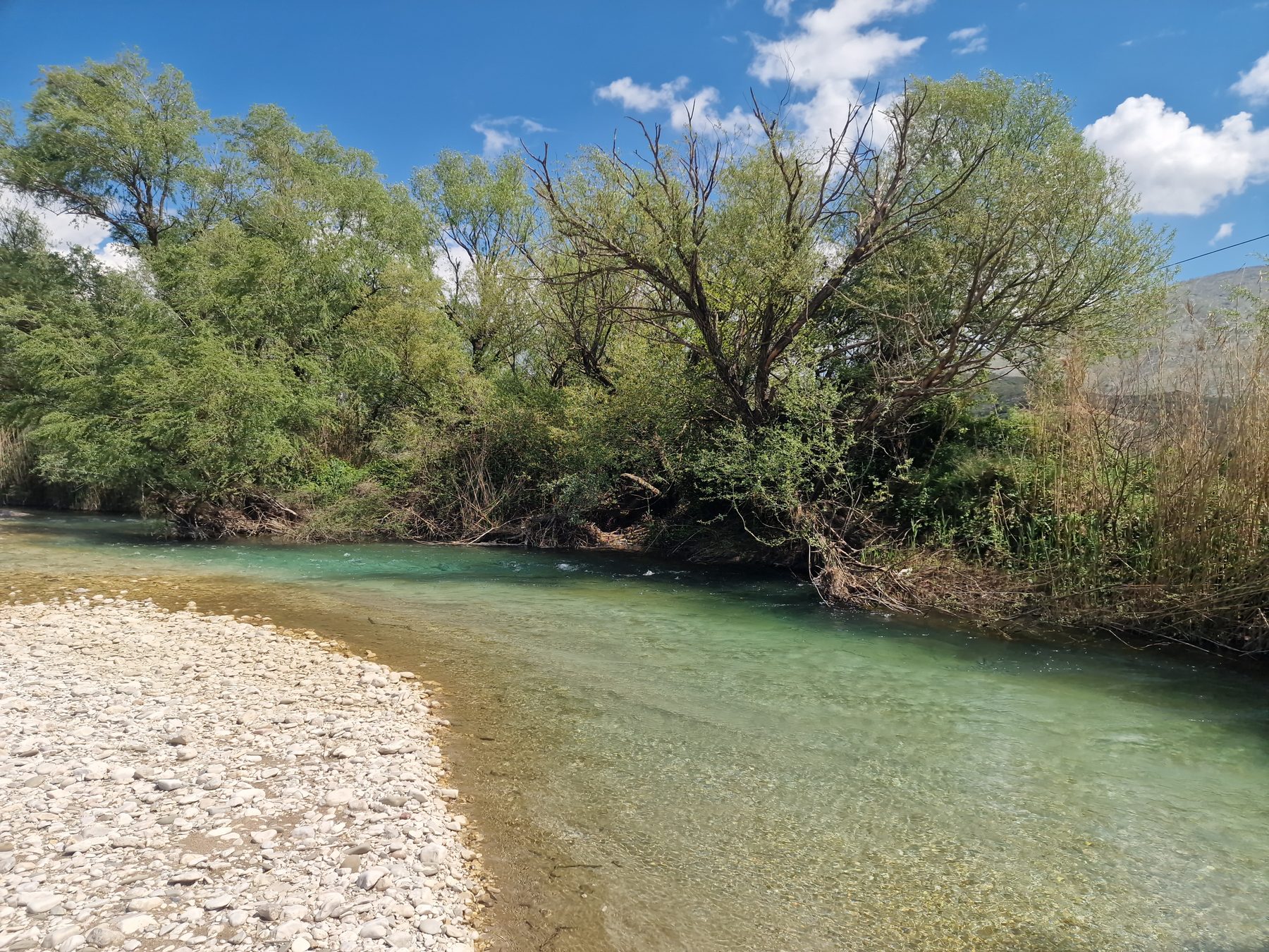 A turquoise bend in the river